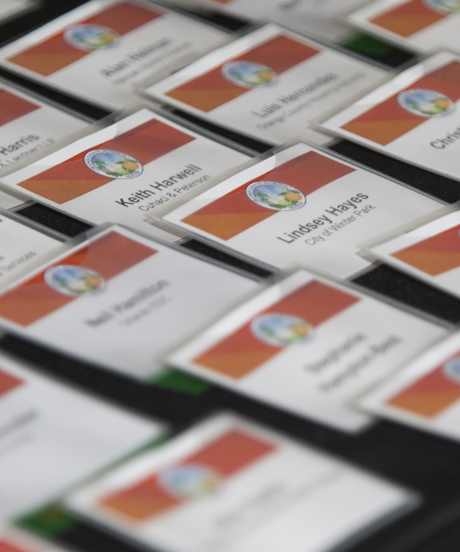 Image of Name Badges at Economic Summit, Links to Economic Summit Page